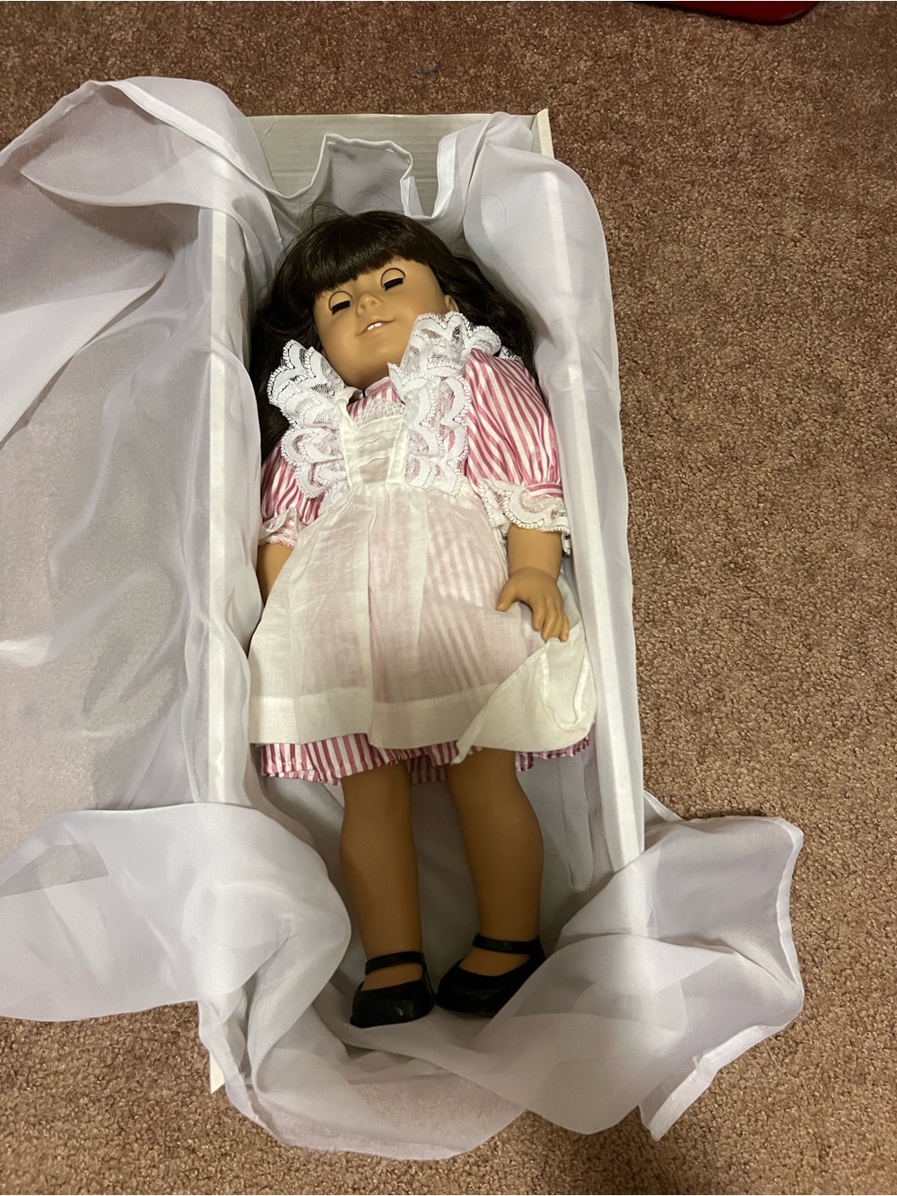 American Girl Doll Samantha. With several outfits and accessories